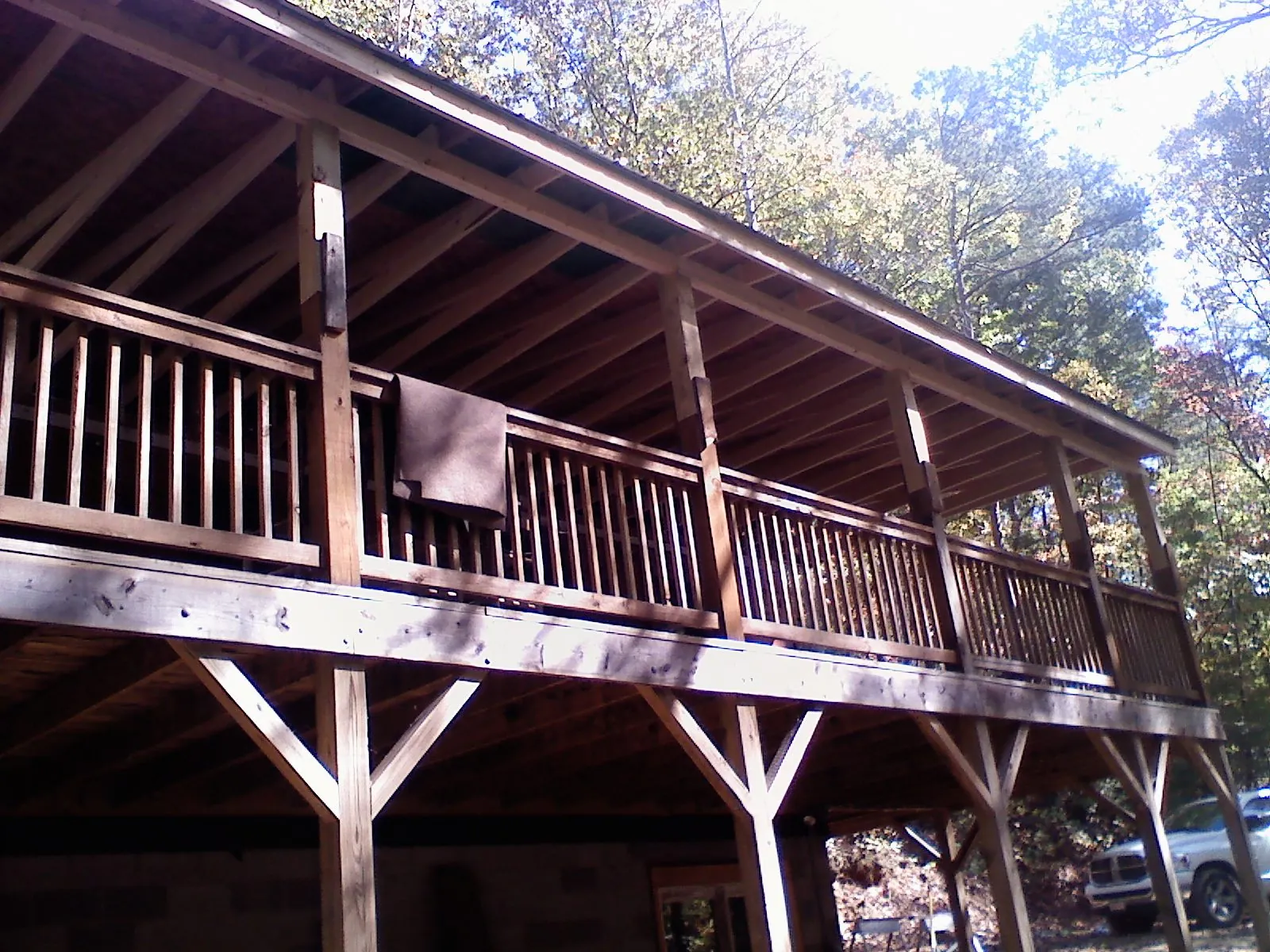 Timber framing under a new elevated porch and deck — Roof Leak Repair in East Sandwich by Roofing Brothers